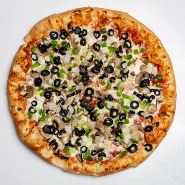 A whole Pizza Place pizza topped with black olives, green peppers, onions, and mushrooms.